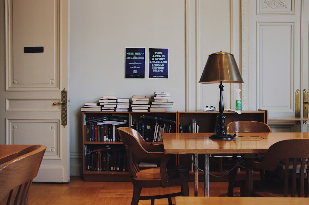 Interior of a modern research institute workspace with bookshelves