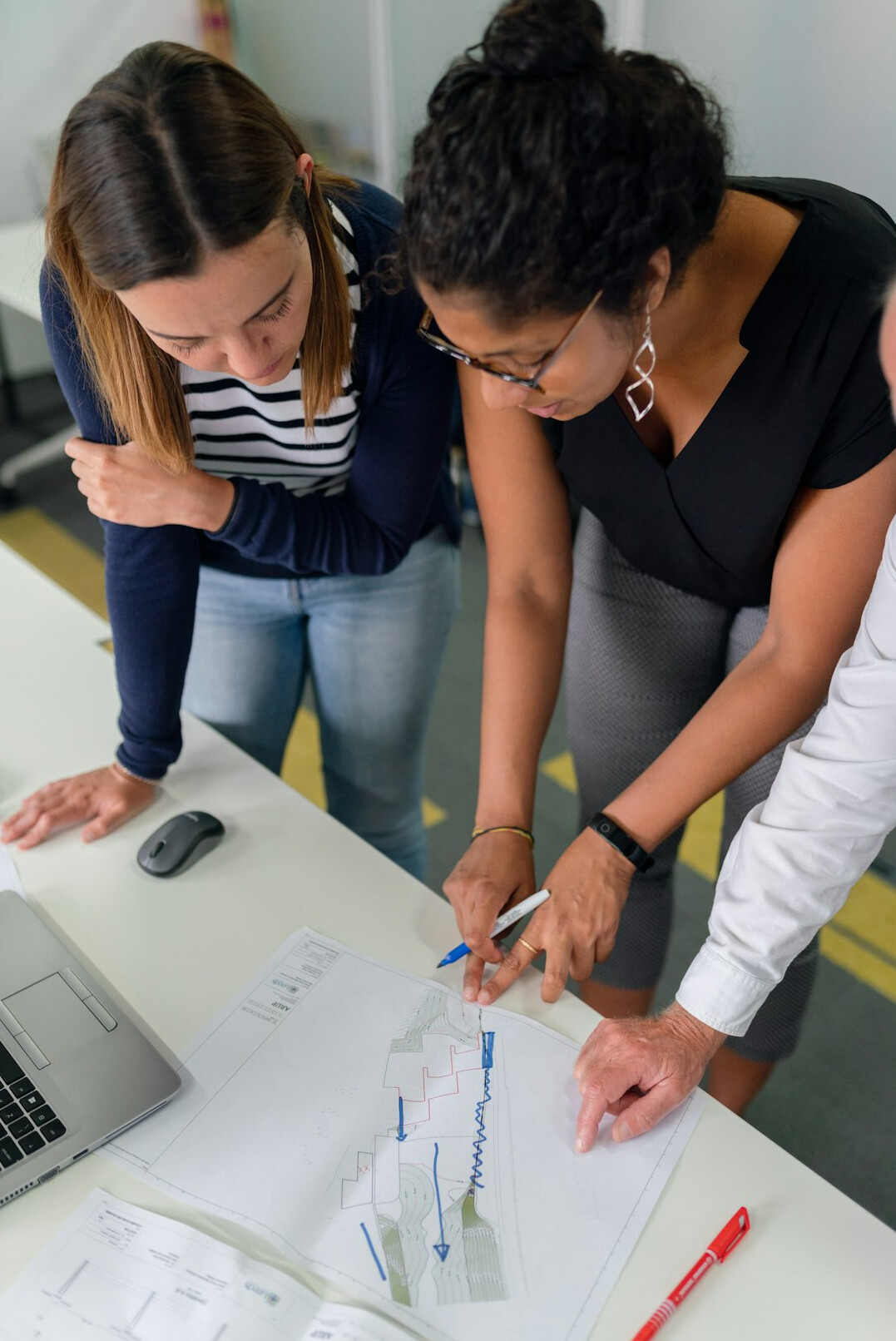 researchers analyzing data charts